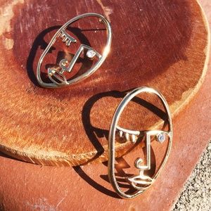 Abstract Face gold statement earrings